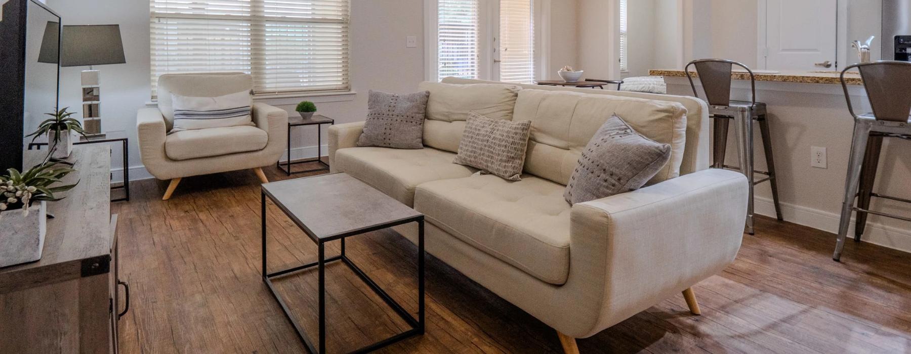 a living room with a couch and coffee table