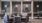 a computer room with a couch and chairs